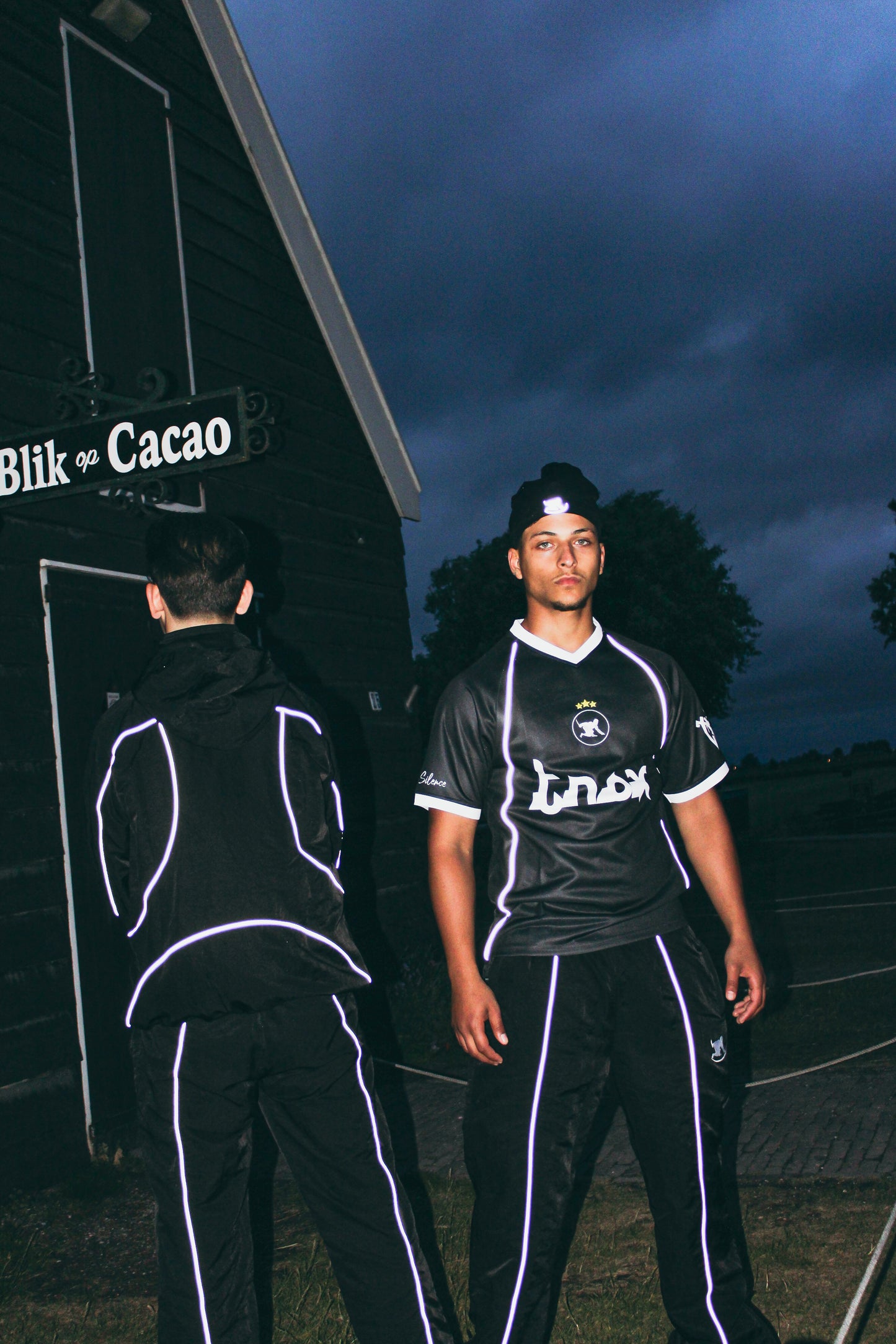 REFLECT WINDBREAKER SUIT - BLACK